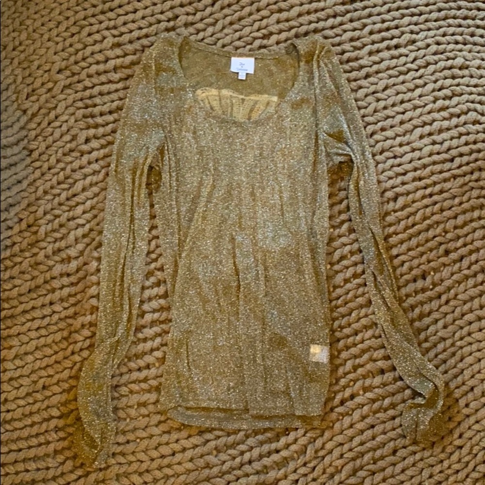 Sparkly see thru top with skull on back